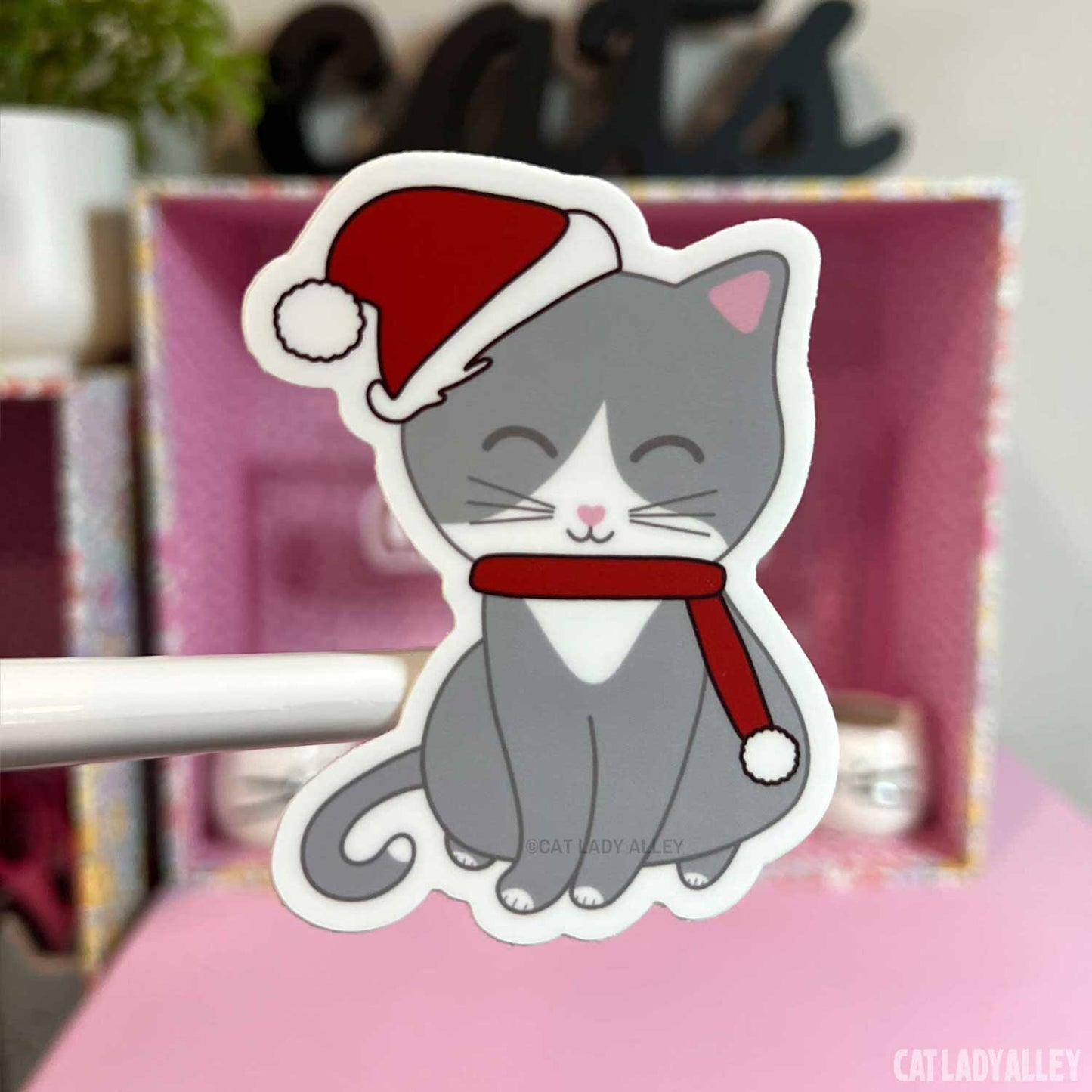 gray and white cat santa sticker