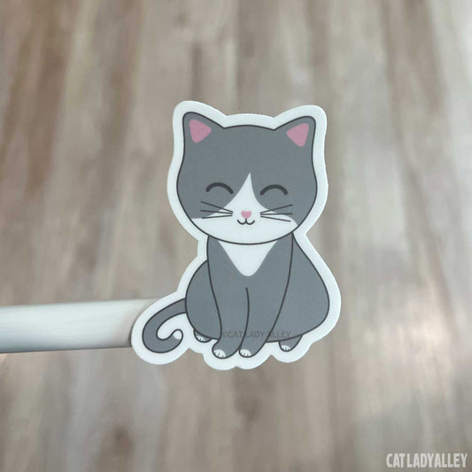 gray and white cat sticker