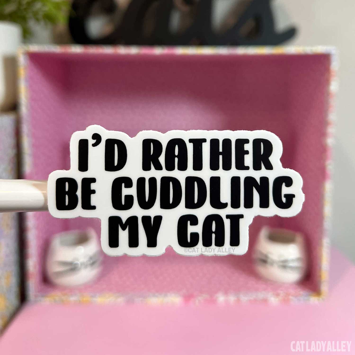 i'd rather be cuddling my cat sticker