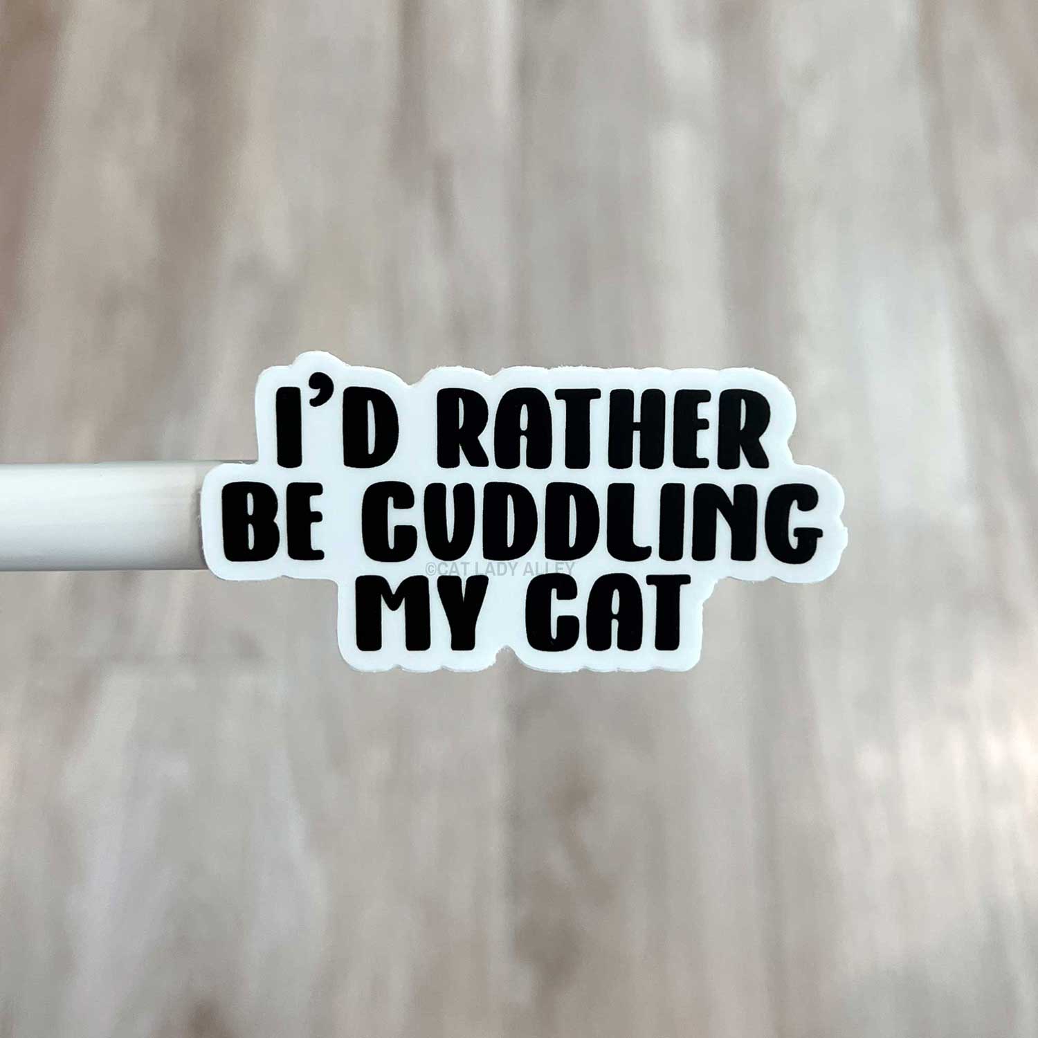 i'd rather be cuddling my cat sticker