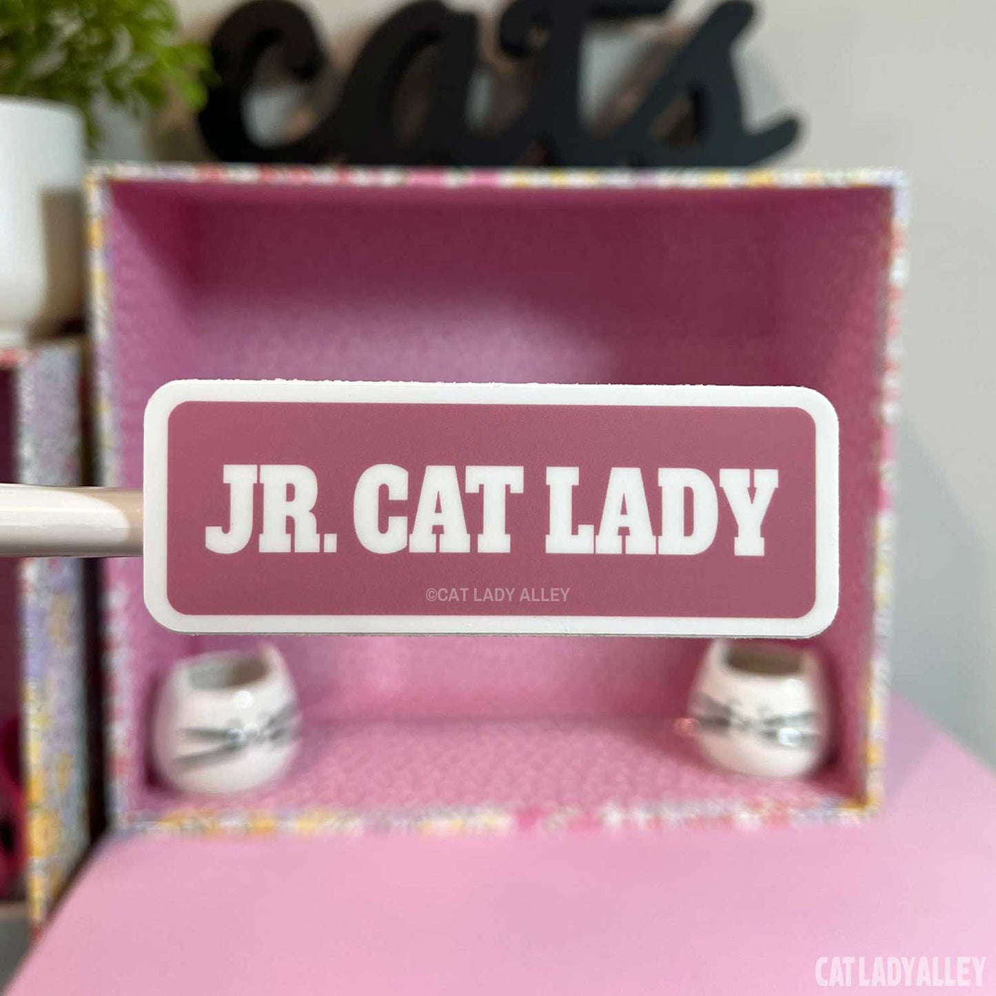 pink junior cat lady sticker