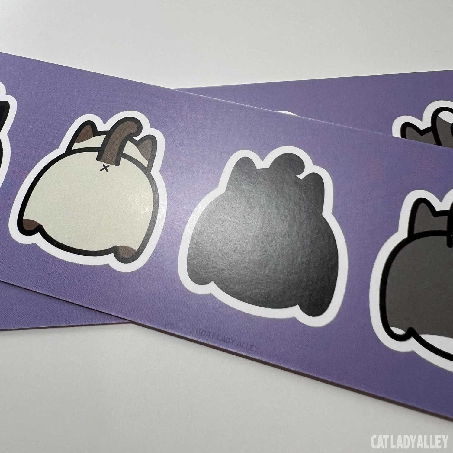 cat butt bookmarks in purple