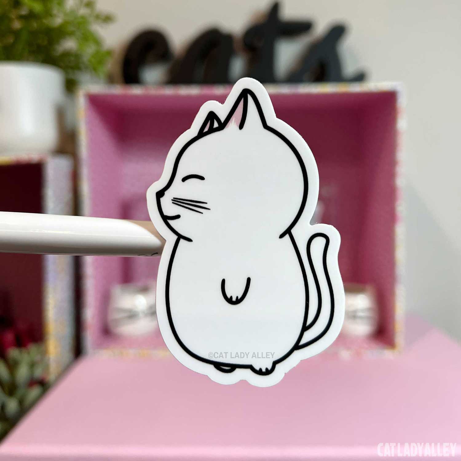 illustrated sticker of happy white cat