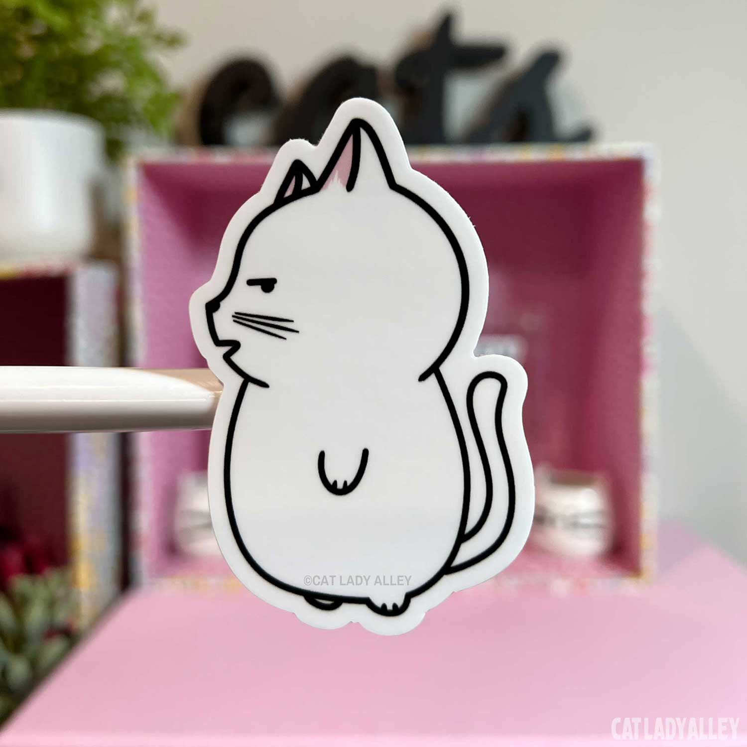 illustrated sticker of white cat talking