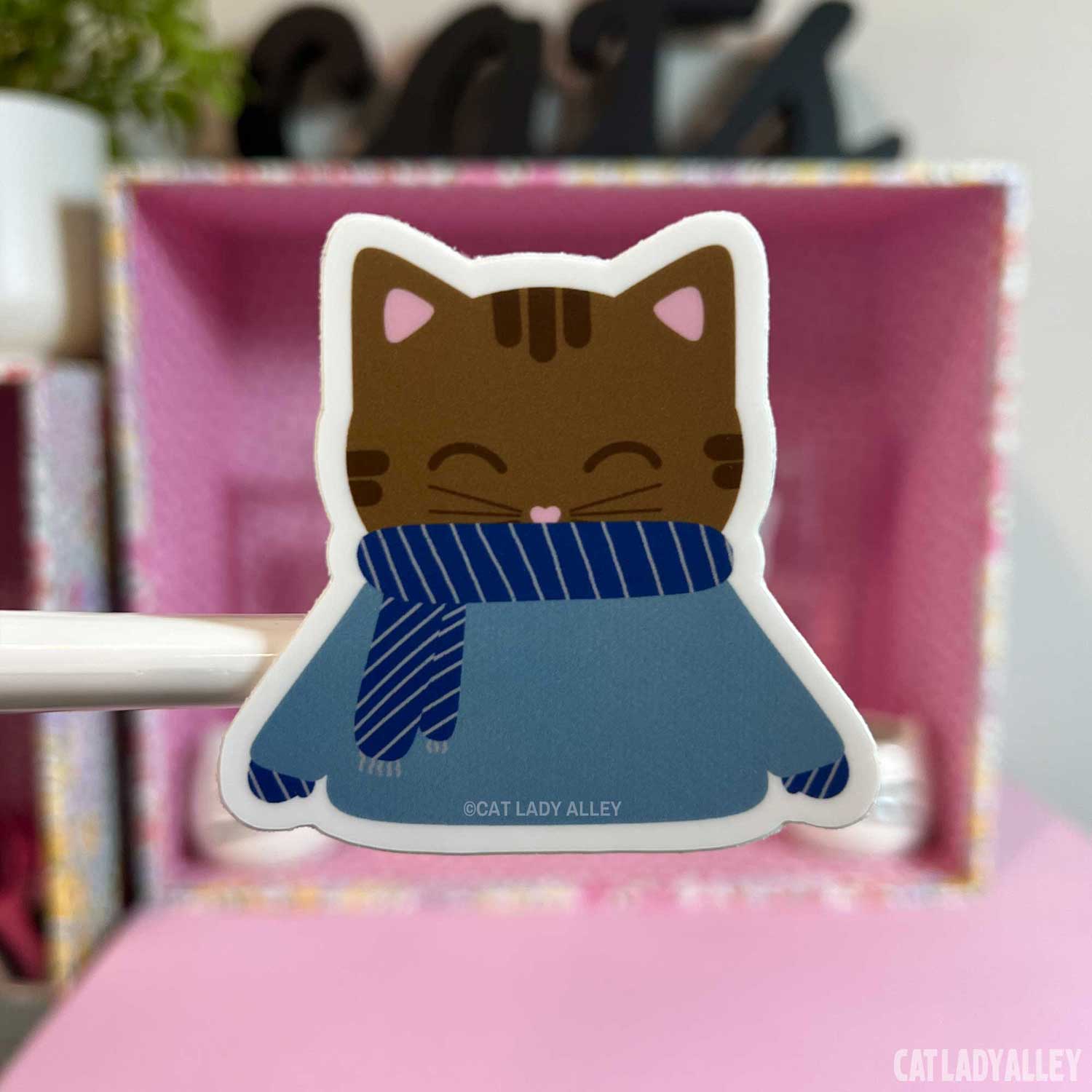 cozy brown tabby cat sticker