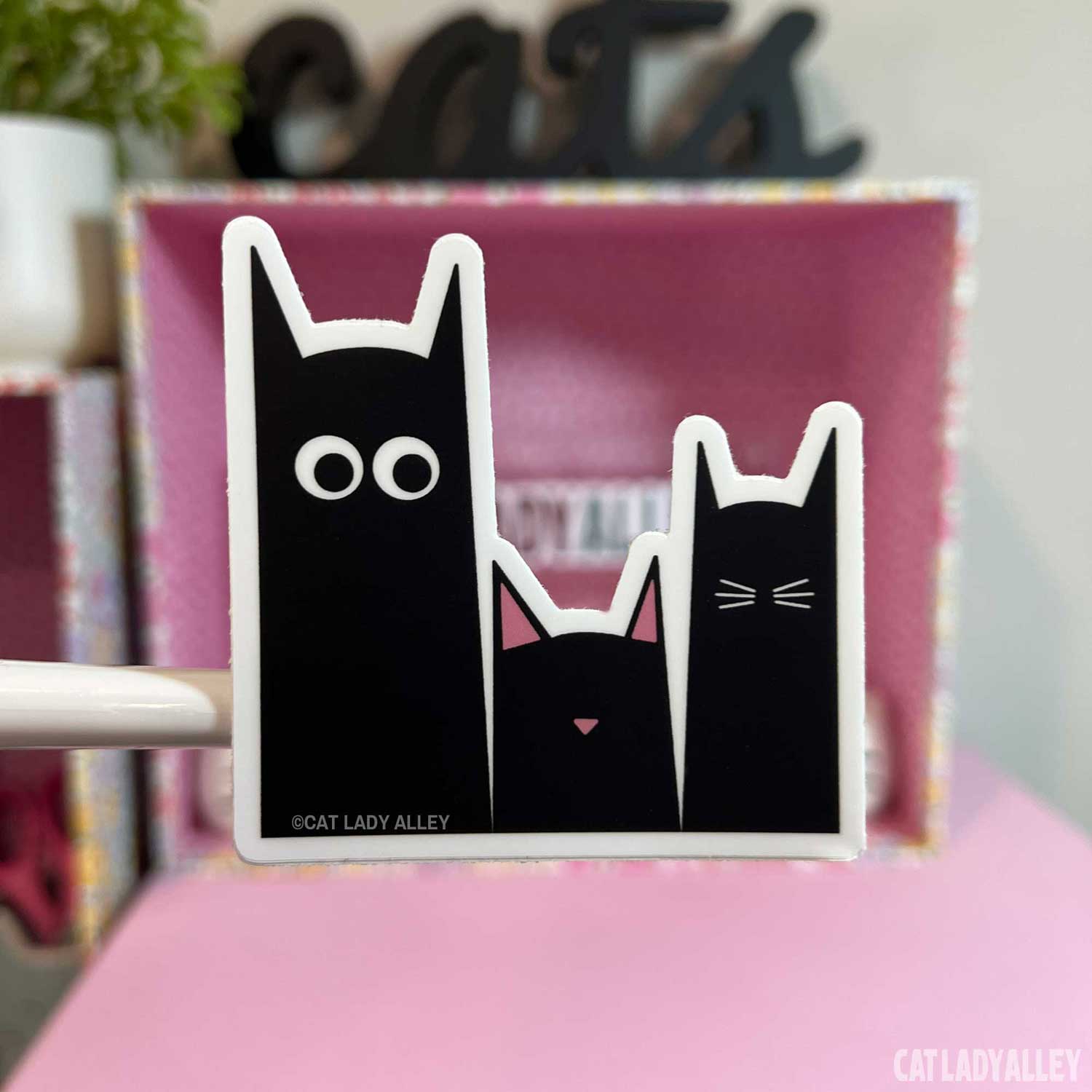 three black cats sticker