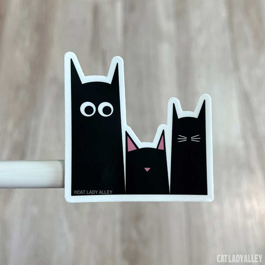 three black cats sticker